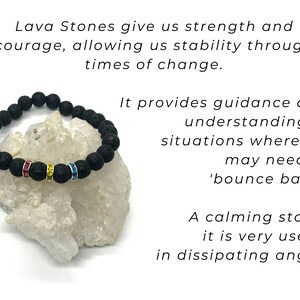 A black lava stone bracelet with a row of pink, yellow and blue rhinestones. The bracelet is on a white rock surface. Lava Stones give us strength and courage, allowing us stability through times of change. It provides guidance and understanding in situations where we may need to 'bounce back.' A calming stone, it is very useful in dissipating anger.