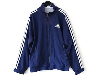 blue and white adidas windbreaker