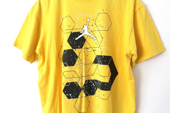 black and yellow jordan t shirt