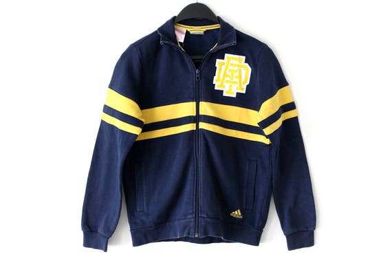 blue and yellow adidas tracksuit