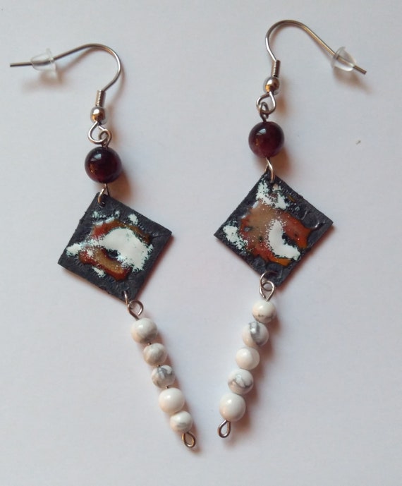 Hanging enamel earrings with garnet and howlite