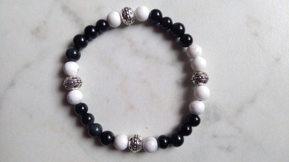 Bracelet pearls diameter 6 obsidian, howlite and spinning top pearl