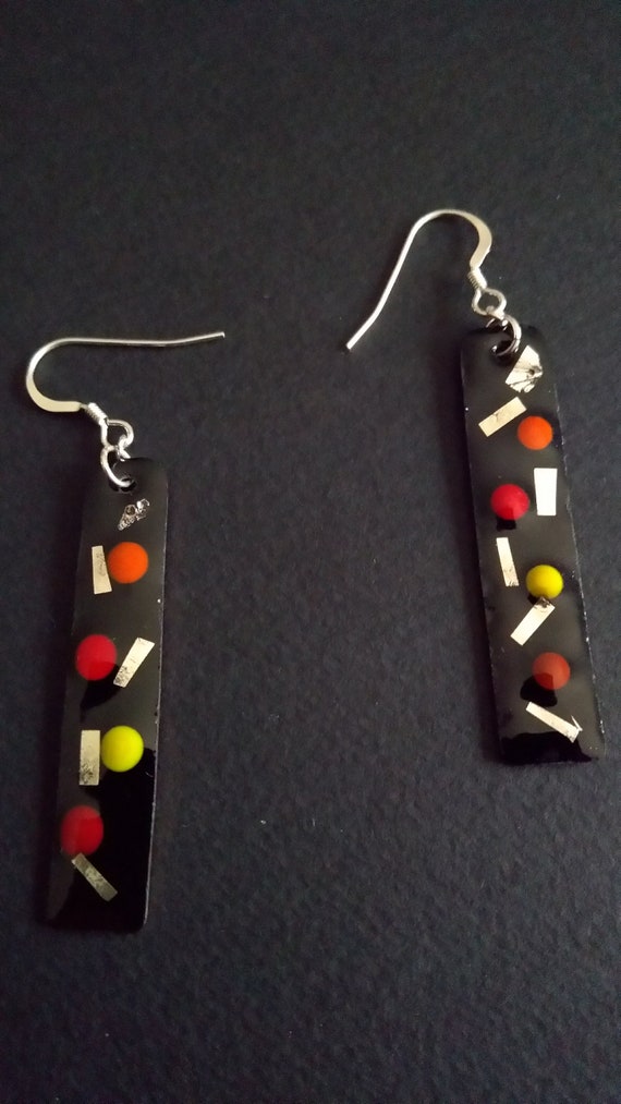 Rectangular dangling earrings in real black enamel with added color and silver flecks
