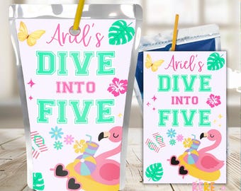 May include: Two juice pouches with the text "Ariel's Dive Into Five". The pouches feature a flamingo on a float, butterflies, tropical leaves, and flowers. One pouch is a larger, clear, stand-up pouch with a straw, and the other is a smaller, rectangular pouch.