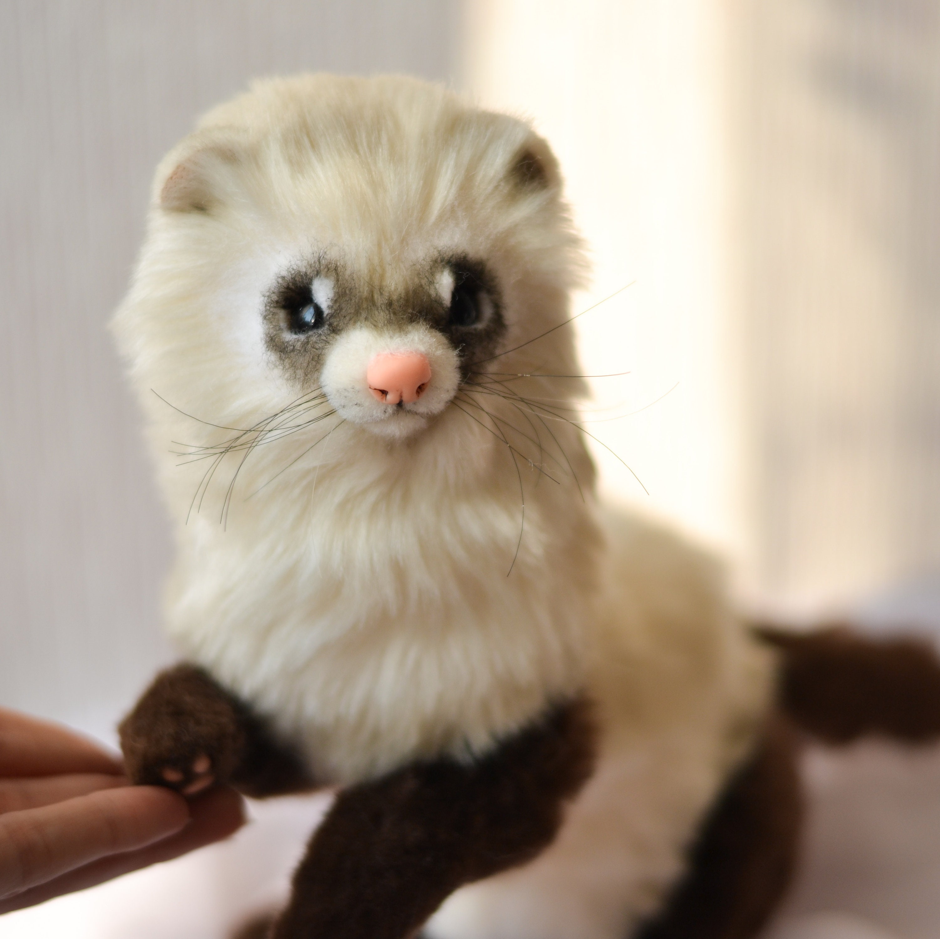 cuddly ferret toy