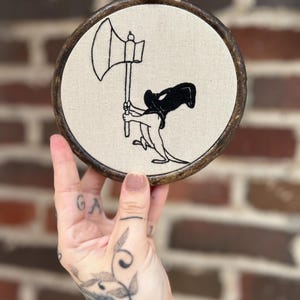 The Executioner - Embroidered Cartoon-Inspired Hoop Art
