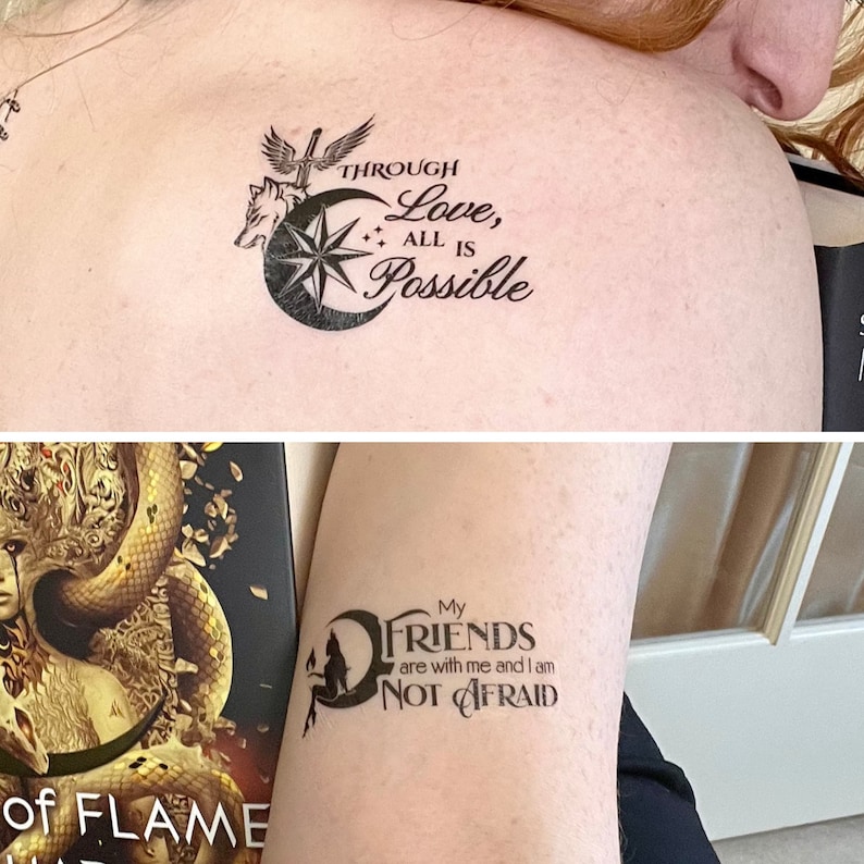 May include: Two temporary tattoos, one with a crescent moon, star, wolf, and sword with the text "Through Love, All Is Possible" and the other with a crescent moon, a figure, and the text "My Friends are with me and I am Not Afraid".