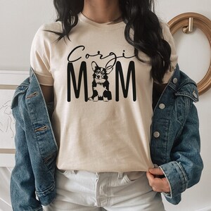 Corgi Gifts Corgi Mom Welsh Corgi Dog Mom Fur Mama Rescue Mom Dog Lover Gift Gifts For Mom Gift For Her Unisex Graphic Tee Soft Cream