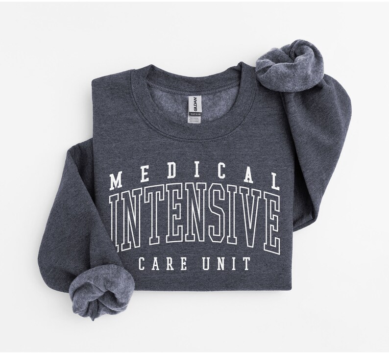 May include: A dark heather gray sweatshirt with white text that reads "MEDICAL INTENSIVE CARE UNIT".