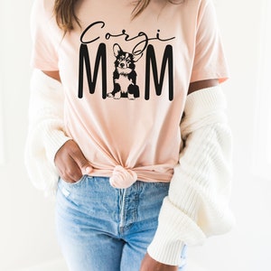 Corgi Gifts Corgi Mom Welsh Corgi Dog Mom Fur Mama Rescue Mom Dog Lover Gift Gifts For Mom Gift For Her Unisex Graphic Tee Heather Peach