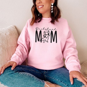 Dachshund Gifts For Her Dachshund Mom Doxie Mama Wiener, Sausage Dog Long Haired Breed Unisex Graphic Sweatshirt Light Pink