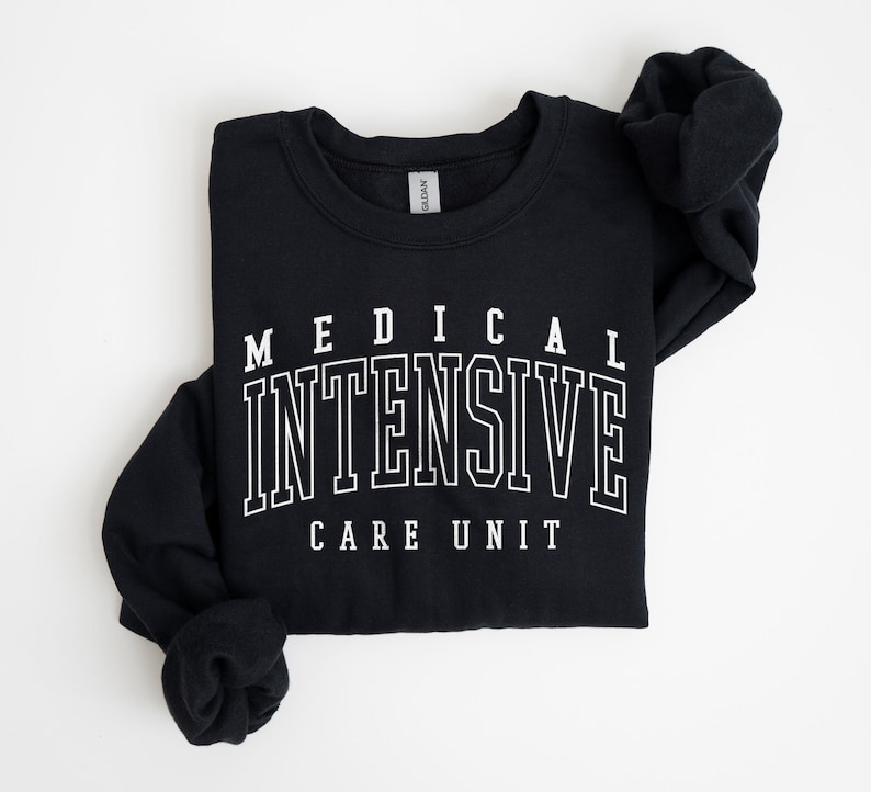 May include: Black sweatshirt with white text that reads "MEDICAL INTENSIVE CARE UNIT".