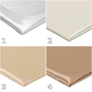 Può includere: Una griglia di quattro campioni di tessuto numerati da uno a quattro. Il primo è bianco brillante, il secondo bianco sporco, il terzo beige chiaro e il quarto è un marrone chiaro. Ogni tessuto ha una finitura satinata, liscia e riflettente.