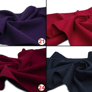 May include: Four fabric swatches in different colors: purple, red, burgundy, and navy blue. The swatches are folded and arranged in a grid pattern.