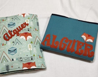 Personalized, handmade diaper travel changing table and wipe holder. Fabric foxes and tipis.