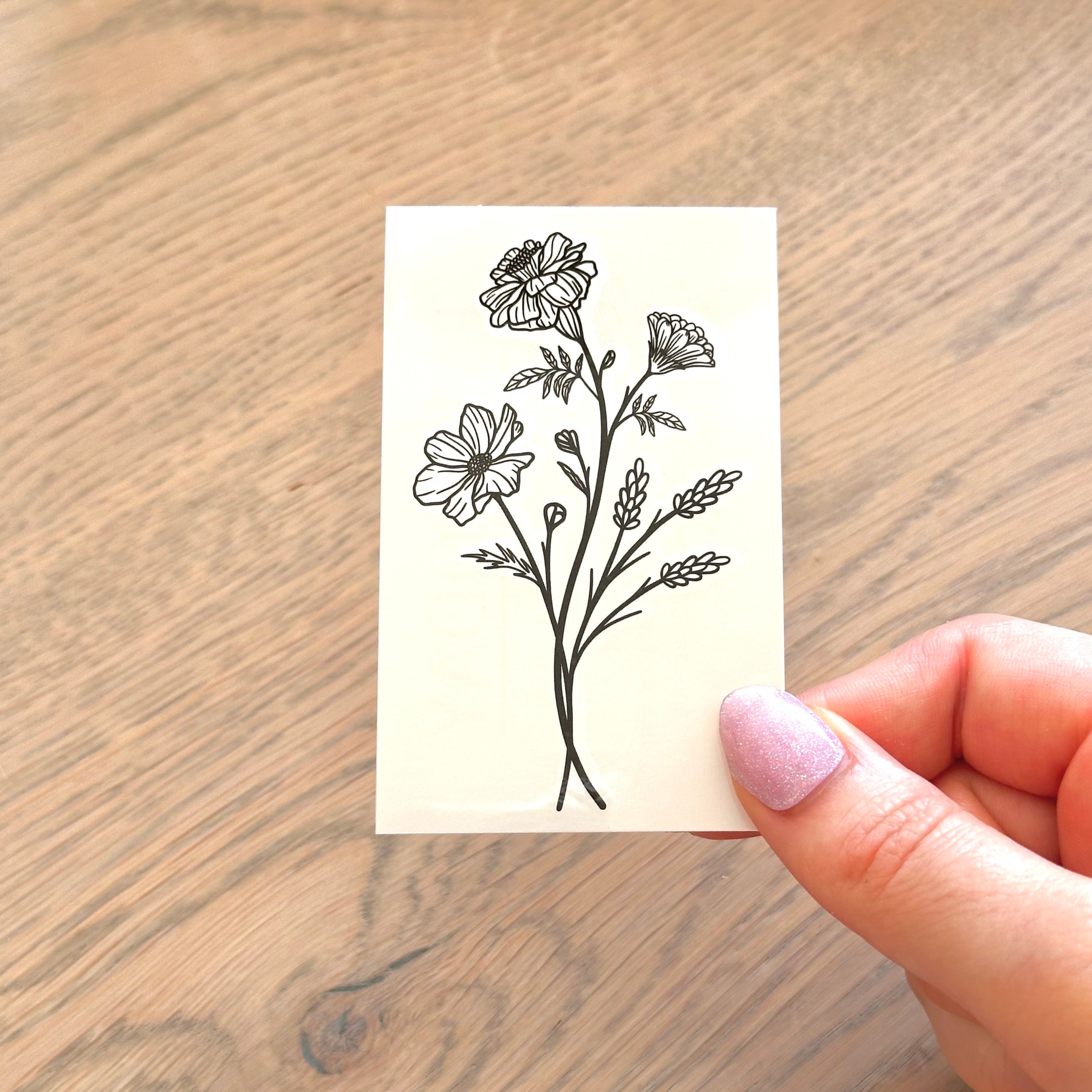 Marigold and Cosmos Tattoo Meaning