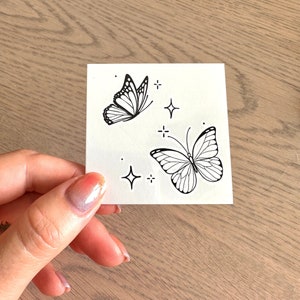 Double Butterflies Sparkle/Stardust (juego de 2) - Tatuaje temporal