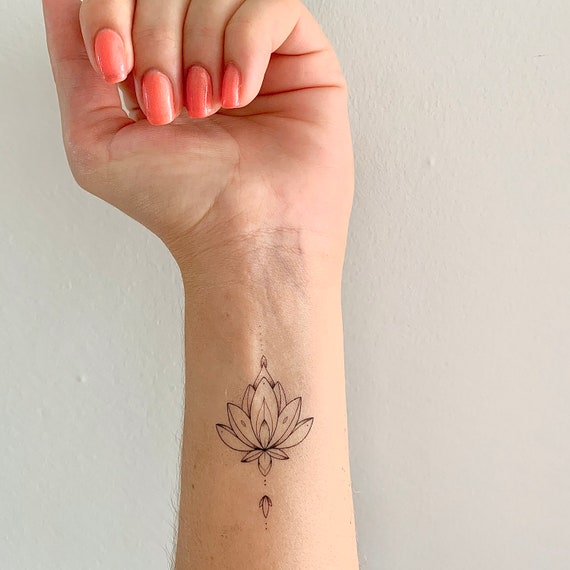 Lotus Flower Tattoo Ideas + Meaning - tattooglee | Simple lotus flower  tattoo, Lotus flower tattoo meaning, Flower tattoo meanings