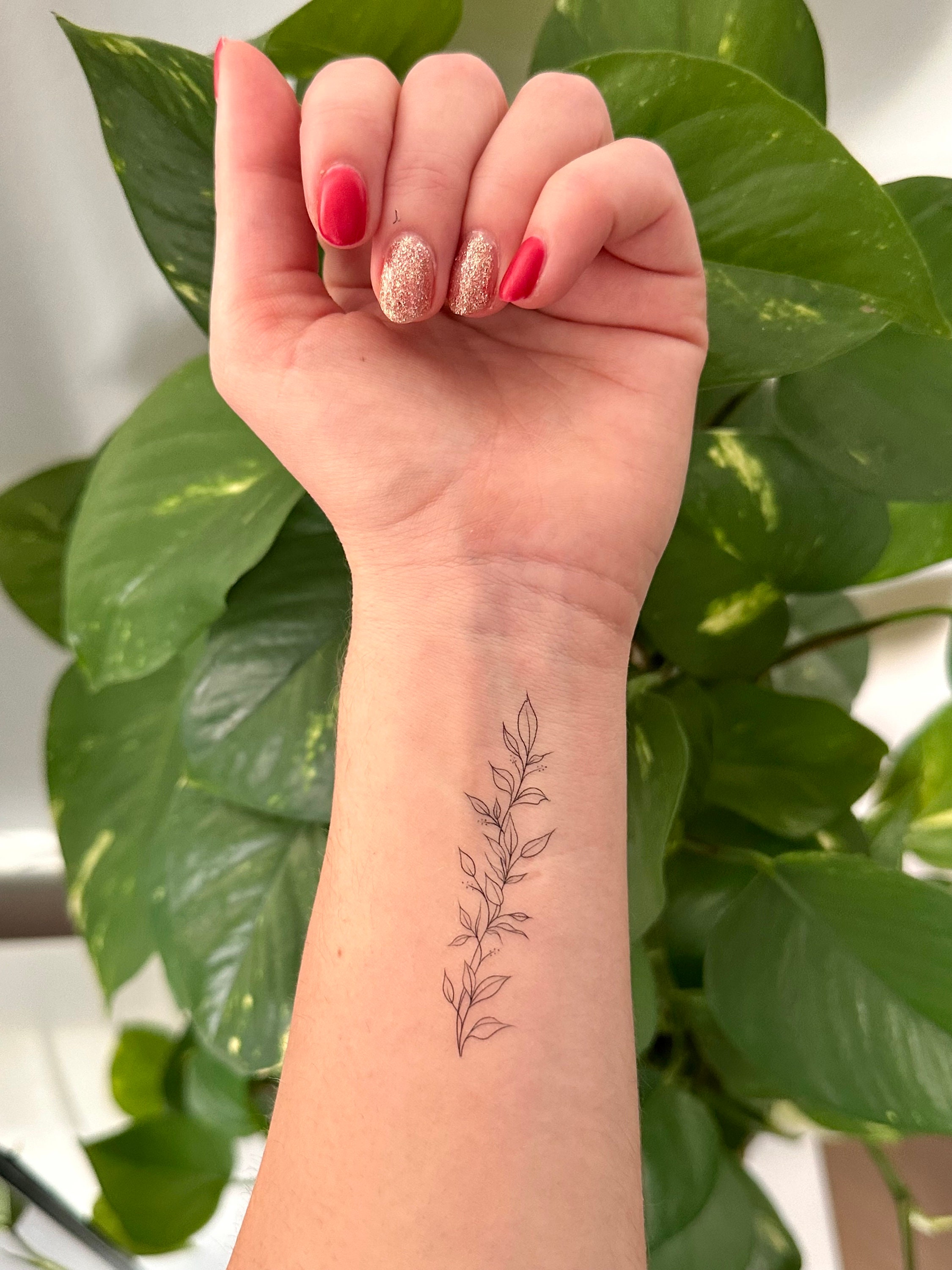 Floral Wrap Around Forearm Tattoo