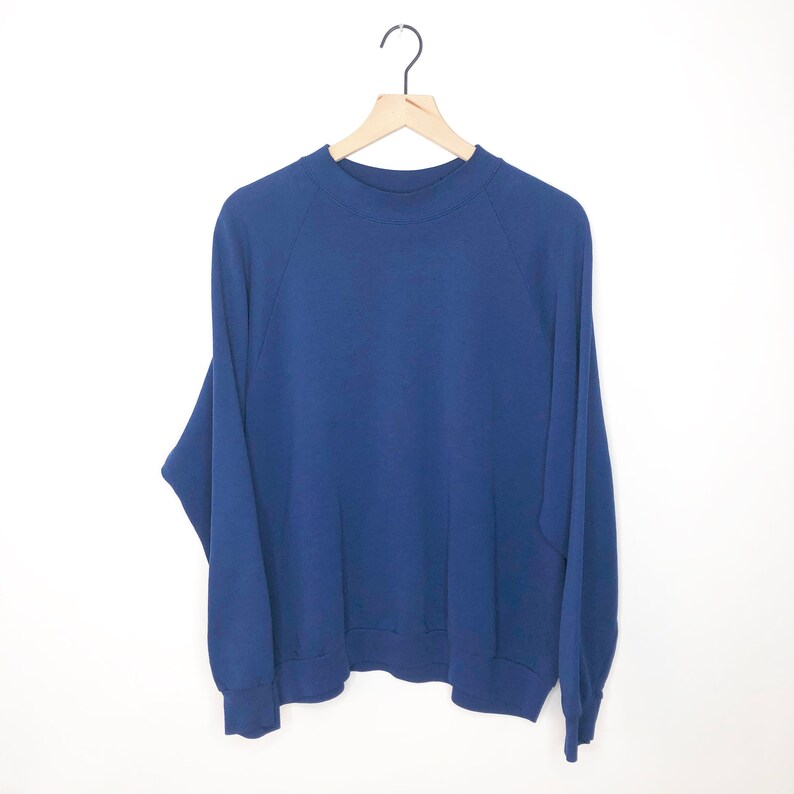 faded blue sweatshirt