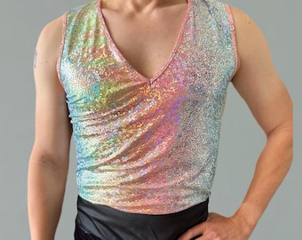 May include: A sleeveless iridescent tank top with a V-neckline. The top has a rainbow-like pattern with shades of pink, green, and blue.