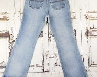 Jeans taille haute évasée bleu des années 90, délavage moyen/Taille 26-27