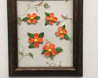 Recycled frame with orange flowers