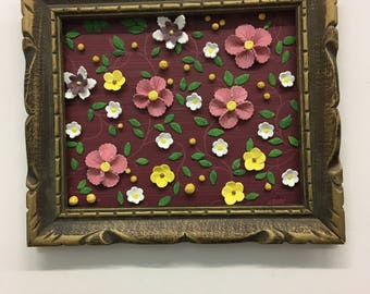 Recycled frame with ceramic flowers