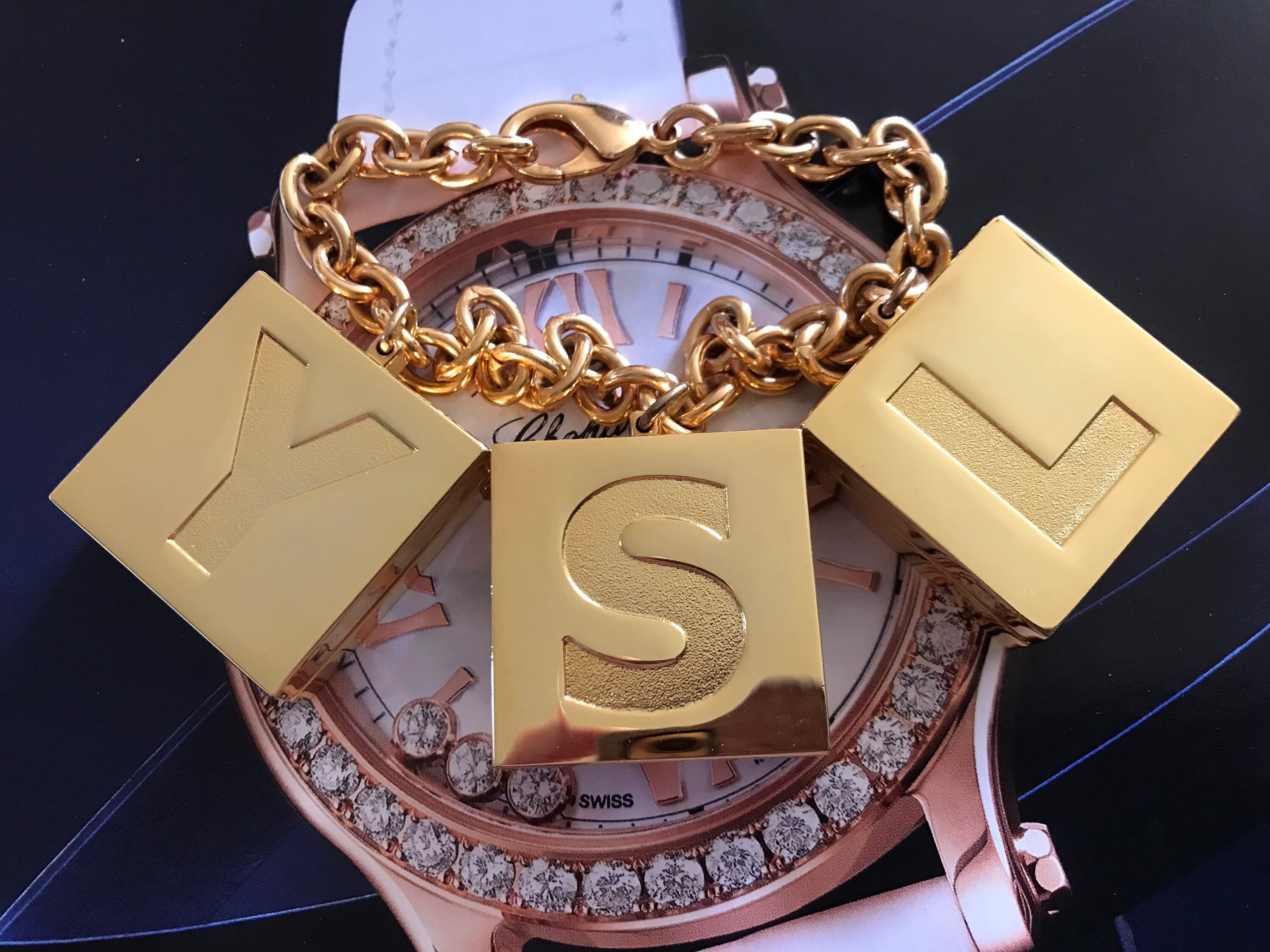 ysl charm bracelet in gold brass review