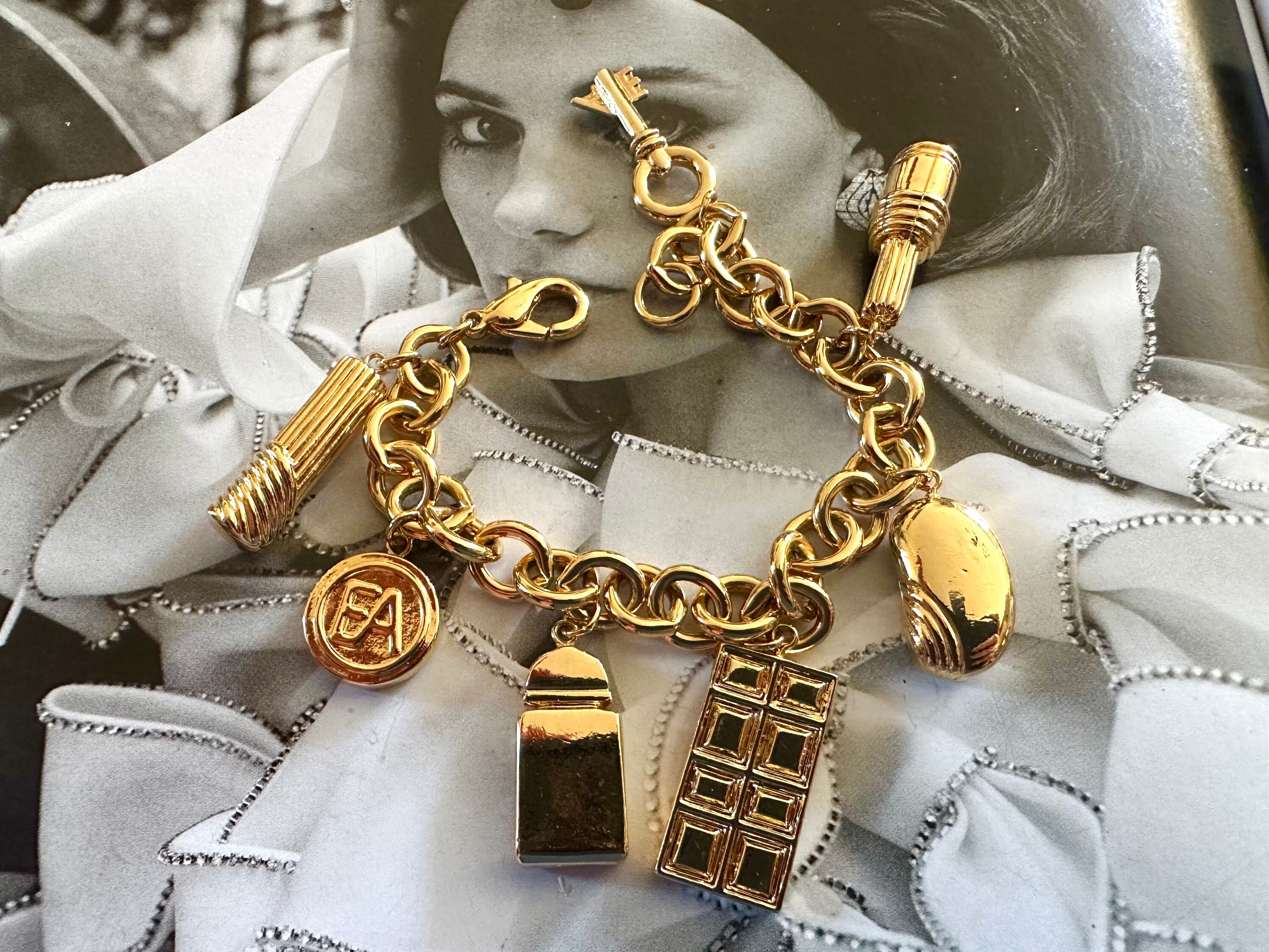 ELIZABETH ARDEN Gold Tone Red Door Charm Bracelet 7 Charms -  Finland