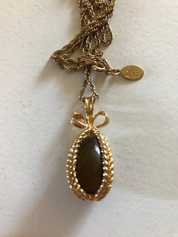 JOAN RIVERS Gold Metal & Brown Glass Egg Necklace,