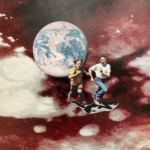 May include: Two children run on a red and white surface with a large blue and white globe in the background.