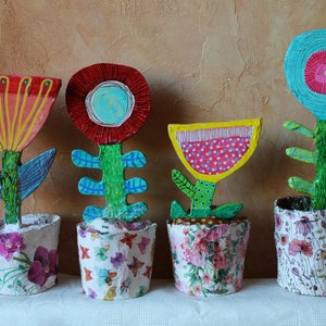 Flowers, window decorations, paper mache