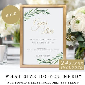 May include: A gold-framed sign with a white background and green watercolor leaves. The sign reads "Cigar Bar" in gold script. The text below reads "Please help yourself and enjoy outside. Respectfully please use the ashtrays provided. Olivia & Mason October 18, 2020". The sign also includes the text "24 Sizes Included".