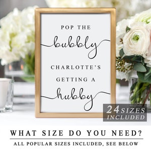 Puede incluir: Un cartel imprimible con marco dorado que dice "Pop the bubbly Charlotte's getting a hubby" con el texto "24 tamaños incluidos" en la parte inferior.