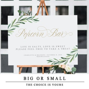 May include: A light blue sign with green watercolour leaves and the text "Popcorn Bar" in gold script. The sign also includes the text "Life is salty, love is sweet. Please feel free to take a treat." and "Charlotte & Brandon - October 19, 2020 #Knowles2020".