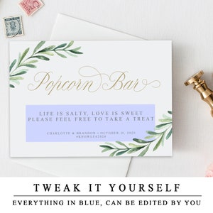 May include: A light blue and white sign with the text "Popcorn Bar" in gold script. The sign also includes the text "Life is salty, love is sweet. Please feel free to take a treat." and "Charlotte & Brandon - October 19, 2020 #Knowles2020".