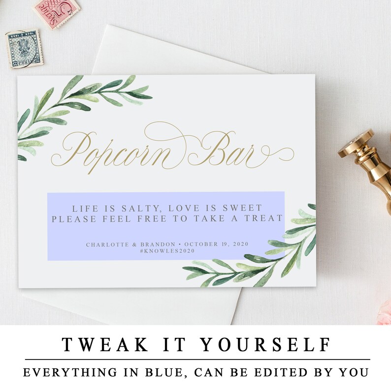 May include: A light blue and white sign with the text "Popcorn Bar" in gold script. The sign also includes the text "Life is salty, love is sweet. Please feel free to take a treat." and "Charlotte & Brandon - October 19, 2020 #Knowles2020".