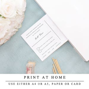 May include: A white RSVP card with black text. The card has a section for the guest's name, a checkbox for attending the wedding, and a checkbox for attending the after party. The card also includes a section for the guest to choose their meal preference: chicken, beef, fish, or vegetarian.