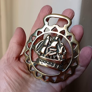 Vintage sailing ship cast Horse brass.  Has back stamp with reg number. British history collectors piece.