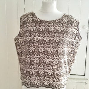 Vintage broderie Anglaise sleeveless blouse by Contesa. Fits a UK 16 - 18. Very pretty for Spring/Summer.