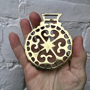 Moline cross cast horse brass, antique collectible, a working horse amulet.