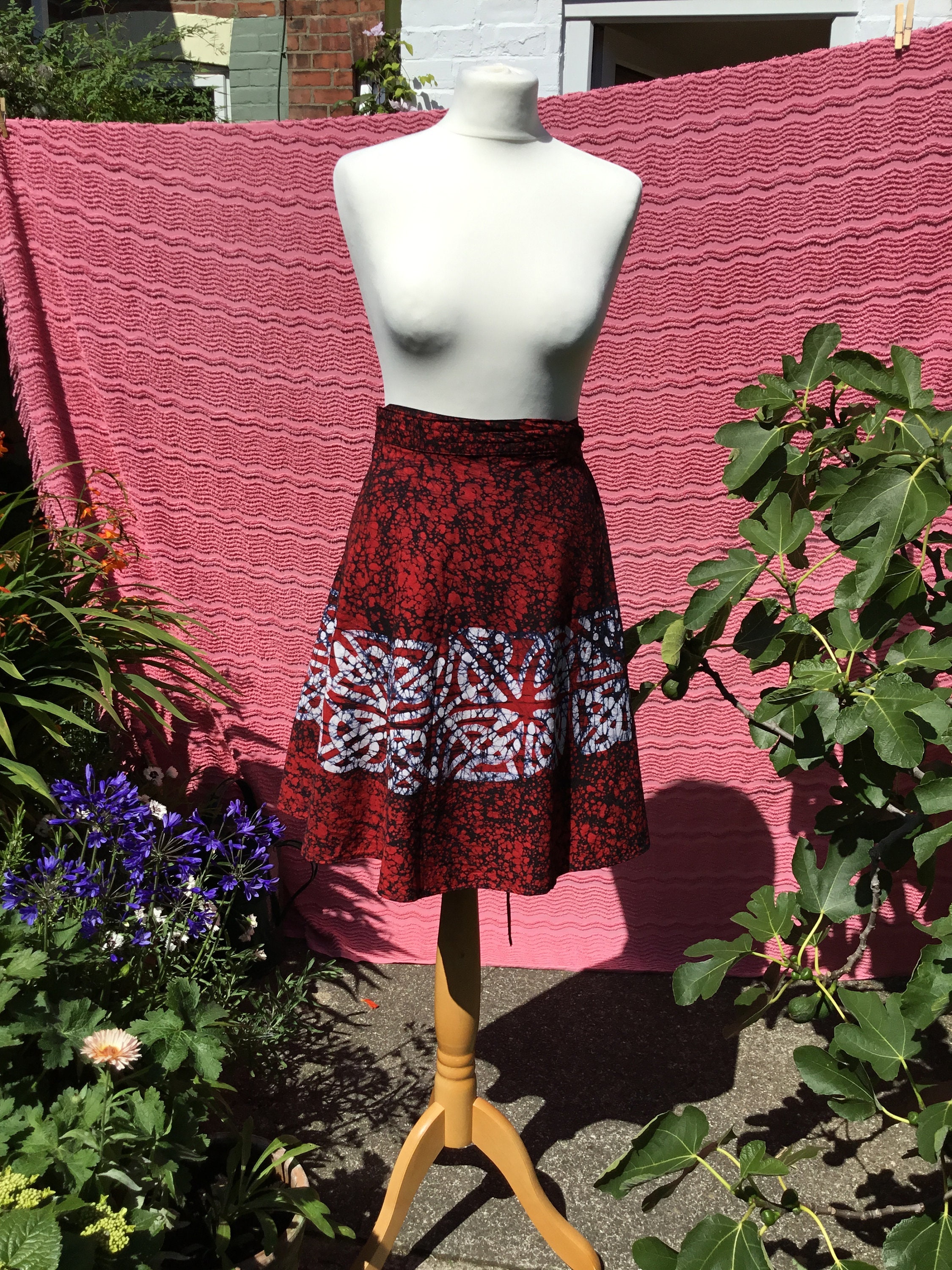 Image of Batik Wrap Skirt, Knee Length Red White & Black Cotton. Free Size, Short Length. Hippy Goth Boho Skirt