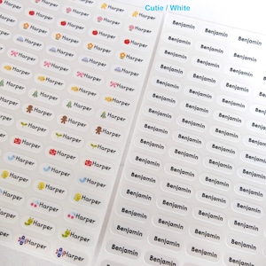 May include: A sheet of white, oval-shaped name labels with a variety of cute illustrations. The labels are printed with the names "Harper" and "Benjamin" in black text.