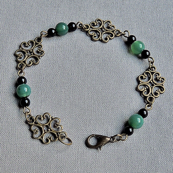 Bracelet perles en agate vertes et noires et connecteurs en métal bronze