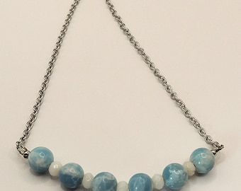 Blue larimar and white jade stone necklace. Silver stainless steel chain