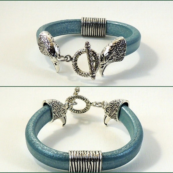 Bracelet en cuir semi-régaliz turquoise avec embouts têtes d'aigles