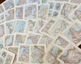 May include: A collection of vintage maps, featuring detailed geographical information. The maps display various regions with a focus on land and water features, using a palette of muted colors. The maps are arranged in a scattered pattern.