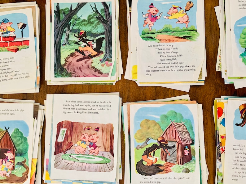 May include: A collection of vintage children's book pages featuring colorful illustrations and text. The images depict scenes from a classic fairy tale, with pigs, a wolf, and various settings.