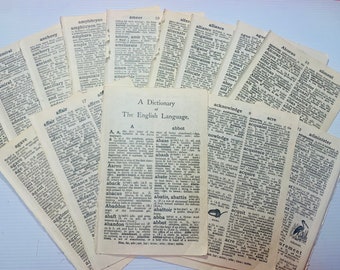 May include: A collection of vintage dictionary pages with words like "ameer", "alliance", "abbot", "acre", and "administer". The pages are yellowed and have a worn, antique look.